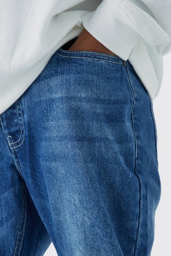 Slim-Fit Schlagjeans mit Druckknöpfen