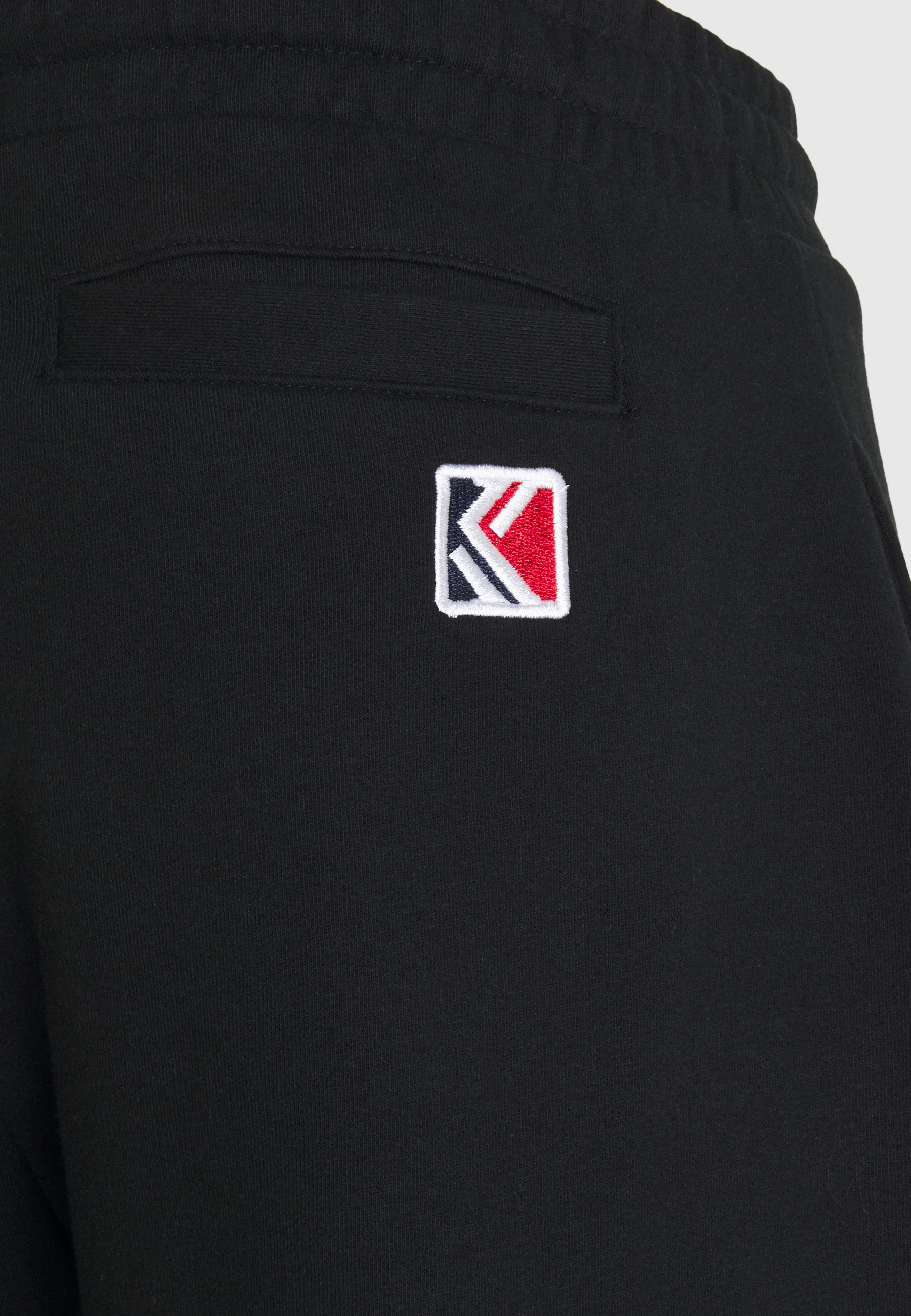 Karl Kani SMALL SIGNATURE UNISEX - Pantalones deportivos