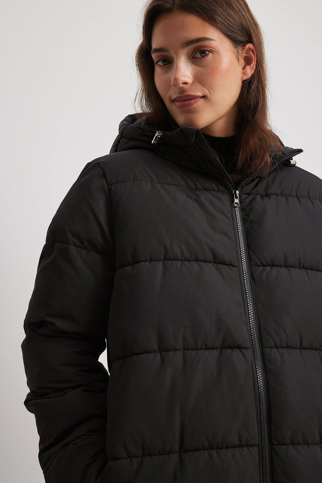 Lange, wattierte Jacke