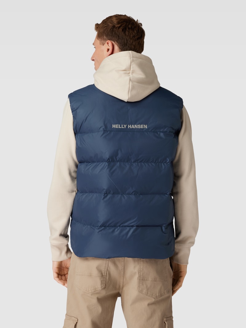 Steppweste mit Stehkragen und Eingrifftaschen in blau