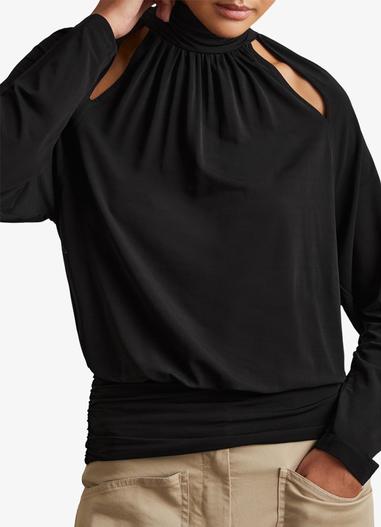 Top Reiss Adrienne con collo alto e dettagli traforati.