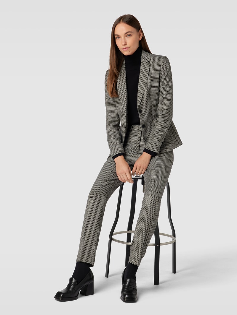 Stoffhose mit Allover-Muster in schwarz