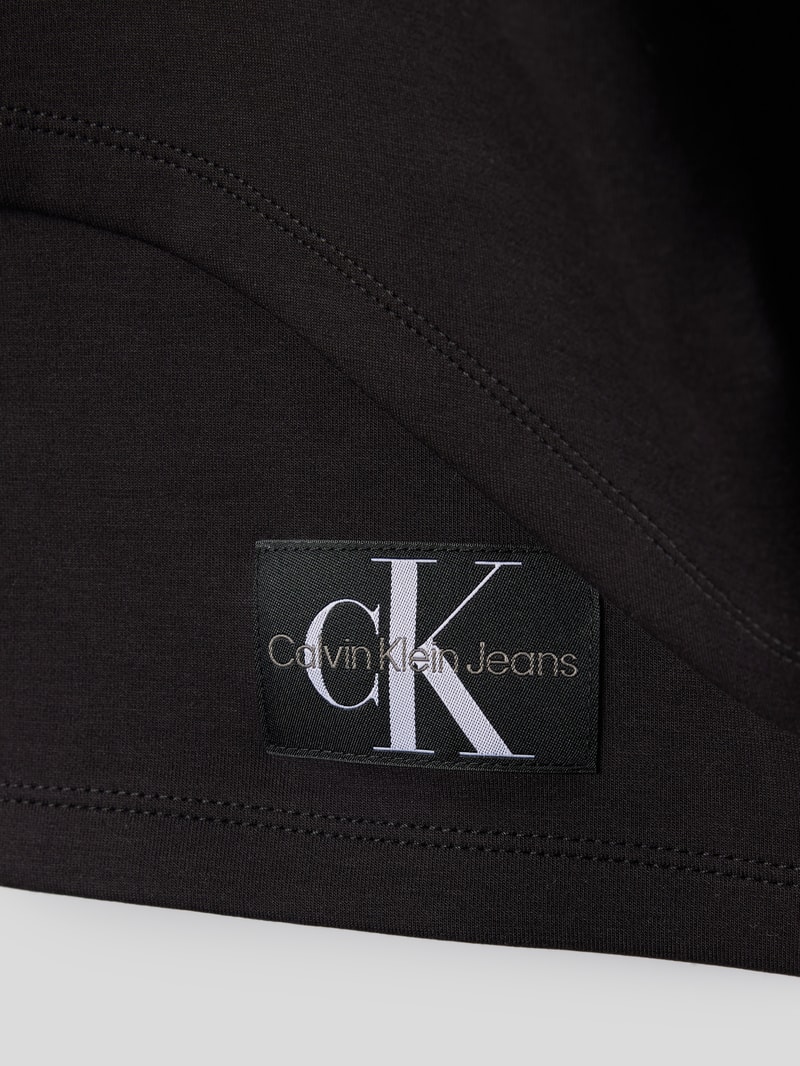 Sweatshirt in Layer-Optik in schwarz