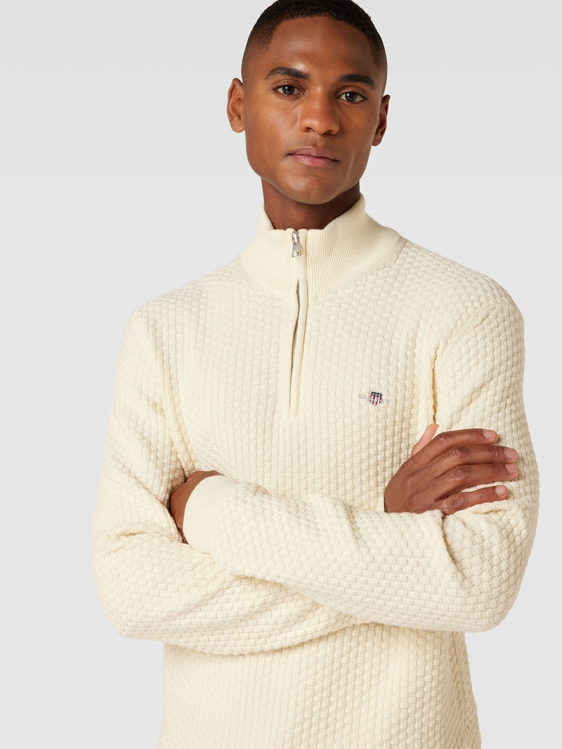 Strickpullover mit kurzem Reißverschluss in offwhite