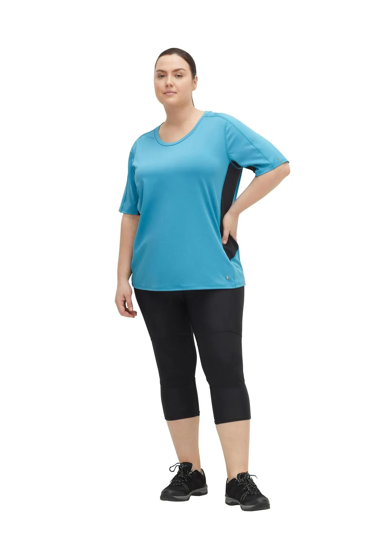 Sheego  Sport-Leggings - Schwarz - Mittlerer Bund