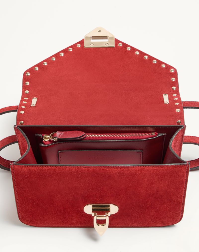 Bolsa de ombro pequena Valentino Garavani Rockstud em camurça
