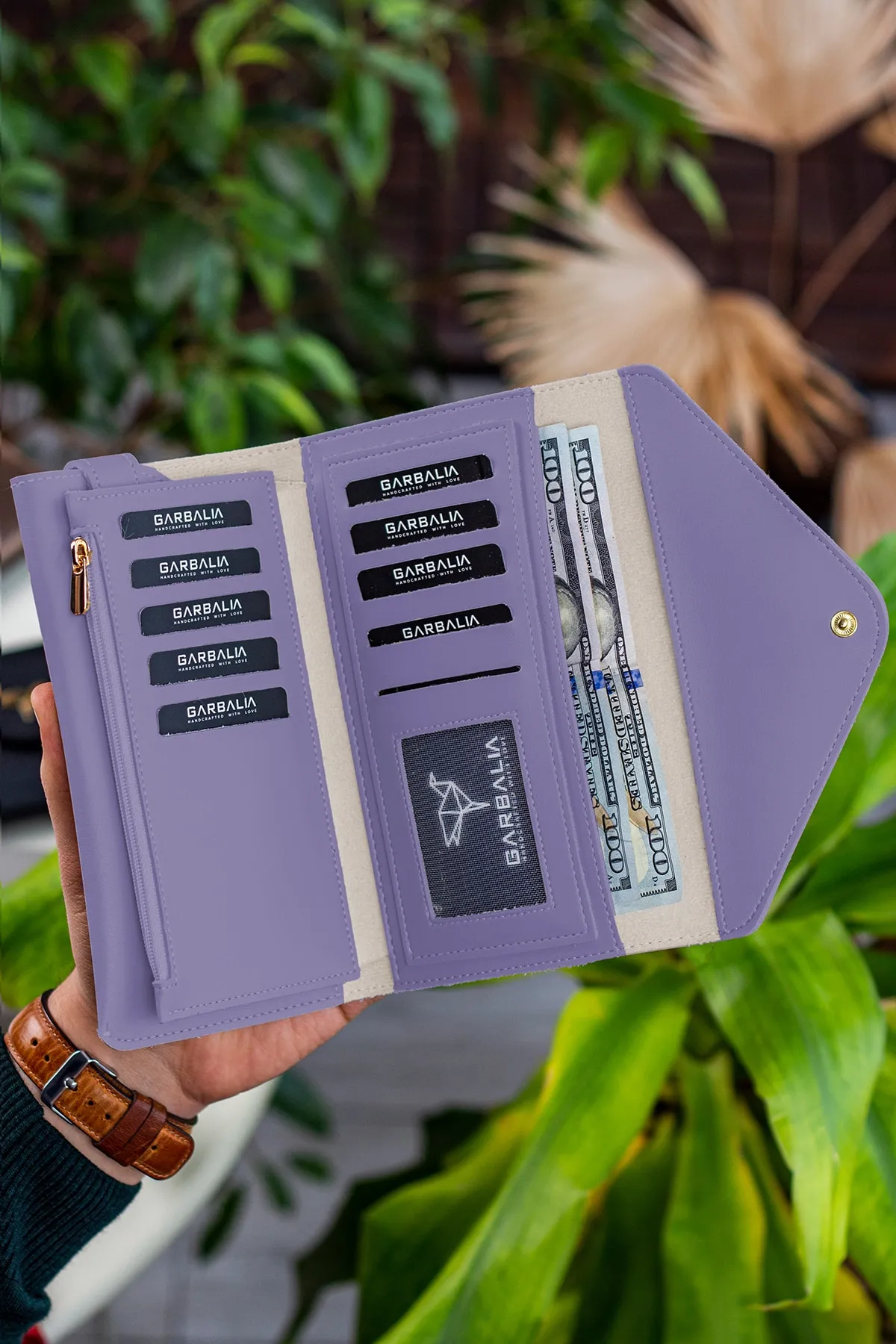 Garbalia  Fliederfarbene Damenbrieftasche mit Umschlagmodell und Telefon- und Münzfächern