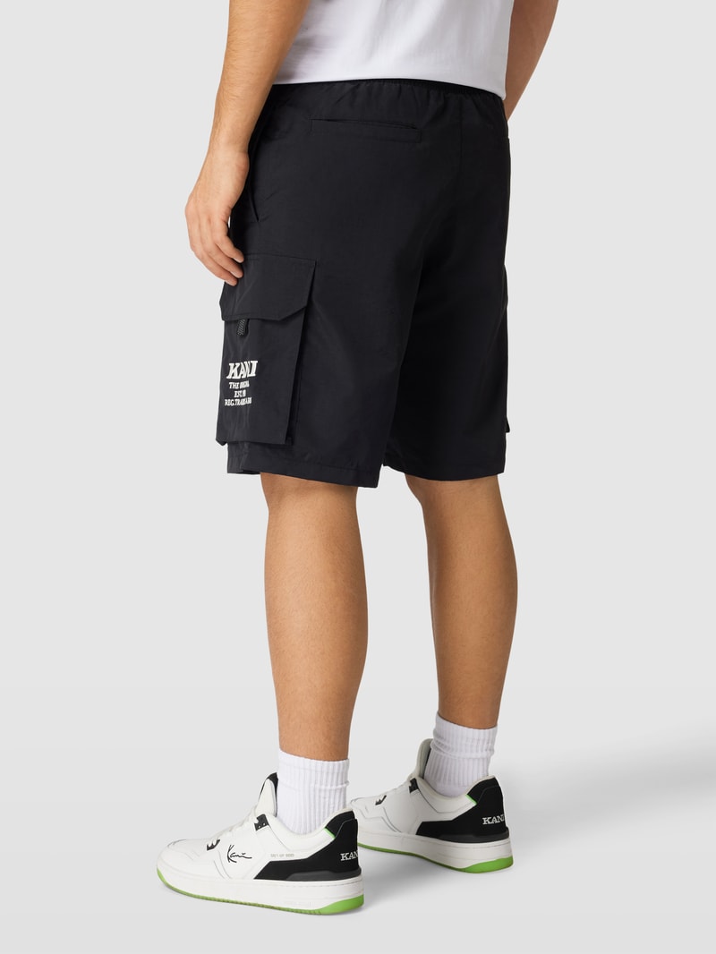 Shorts mit Cargotaschen - P&C x Karl Kani in schwarz