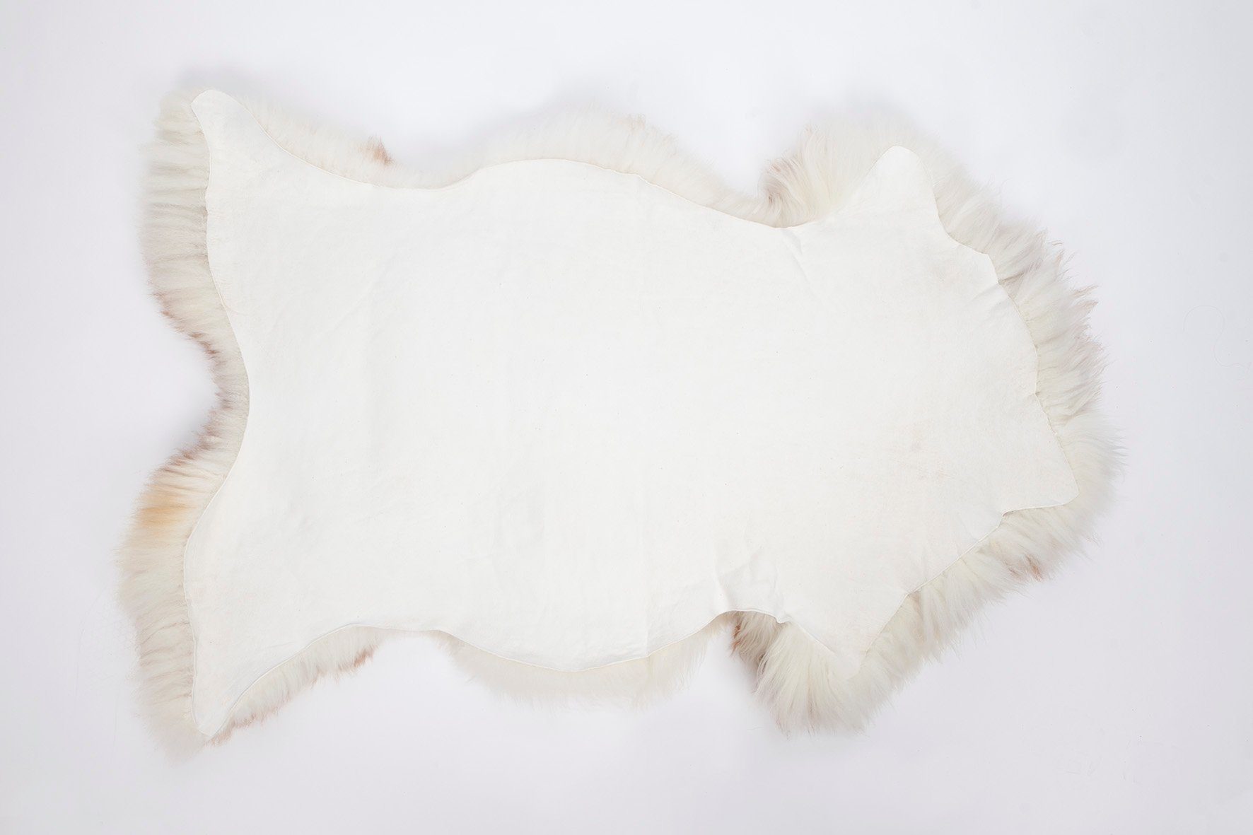 Fellteppich Pioniers Verkauf Schaffell Lammfell silbern-stracciatella 110-119 cm, Pioniers Verkauf