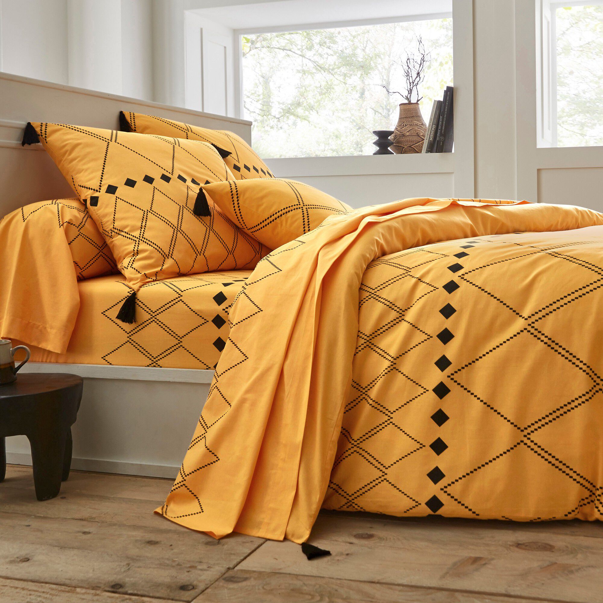 Linge de lit Massaï coton à motifs graphiques et finitions pompons