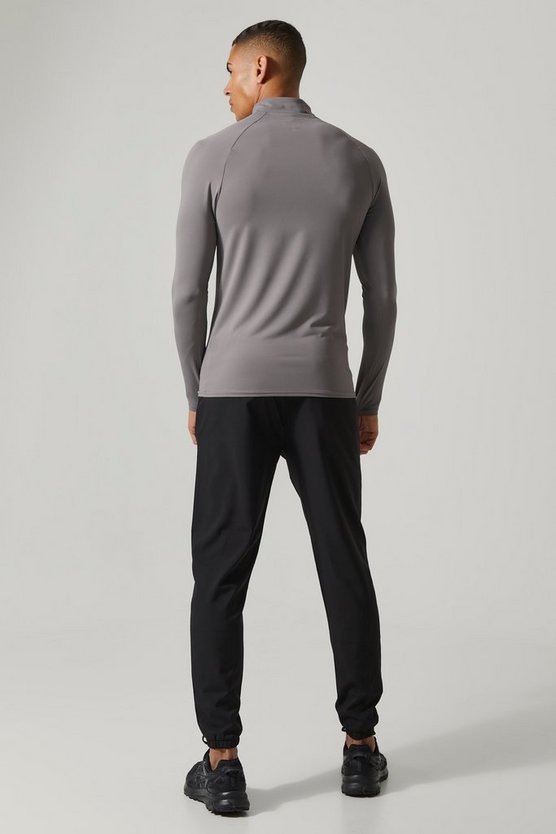 Man Active strukturiertes Slim-Fit Oberteil aus Mesh mit 1/4 Reißverschluss