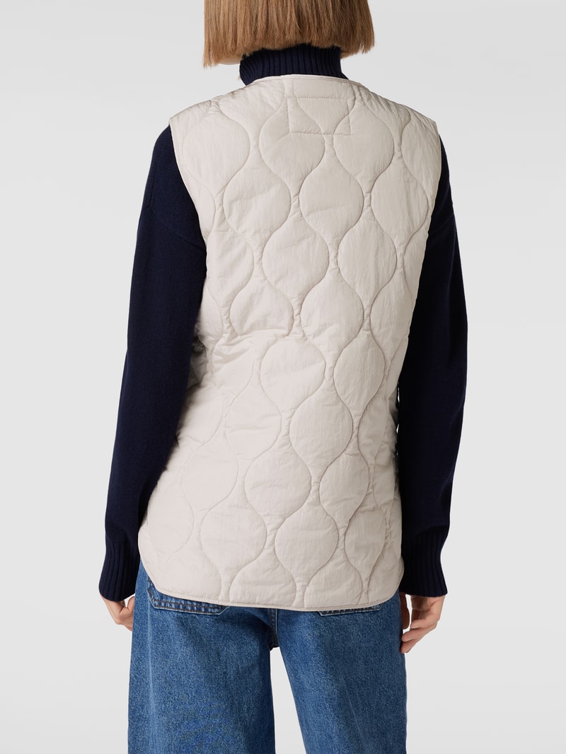 Steppweste mit Reißverschlusstaschen in offwhite