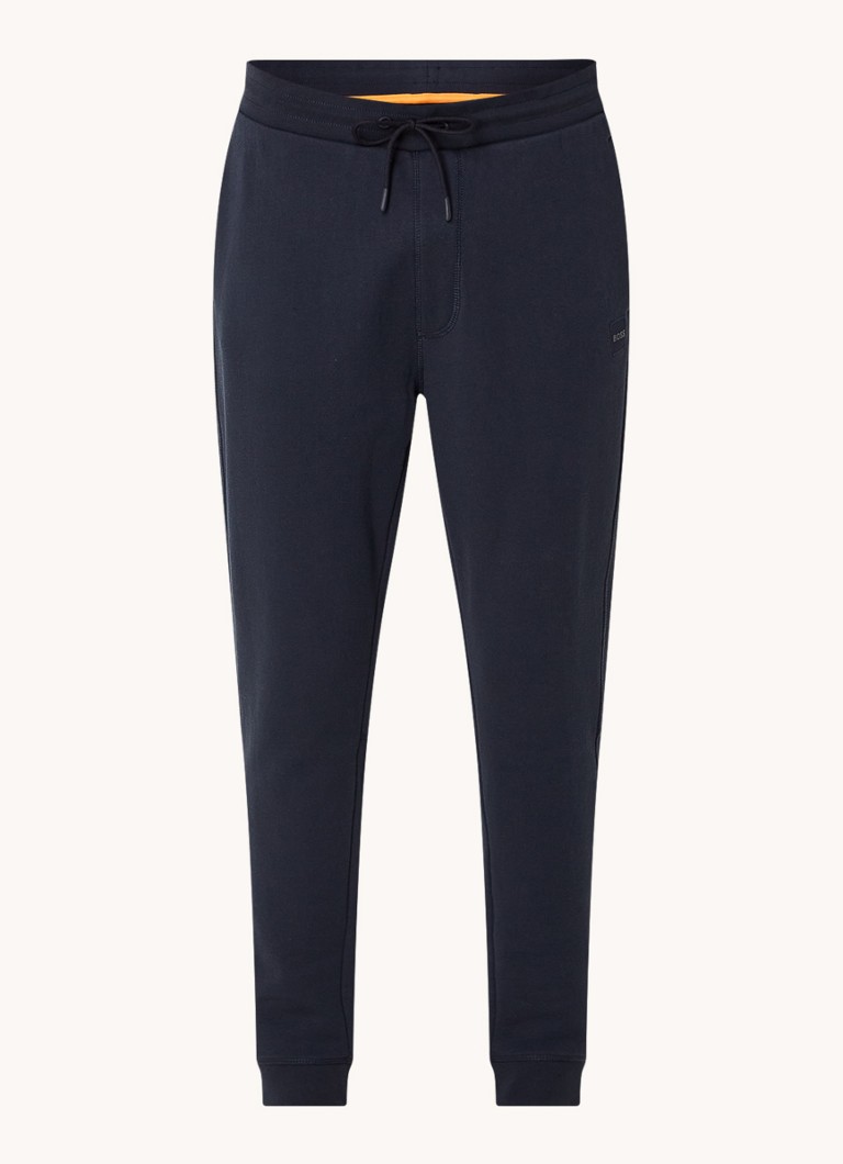 Pantaloni de trening slim fit de la HUGO BOSS, cu logo și buzunare laterale.