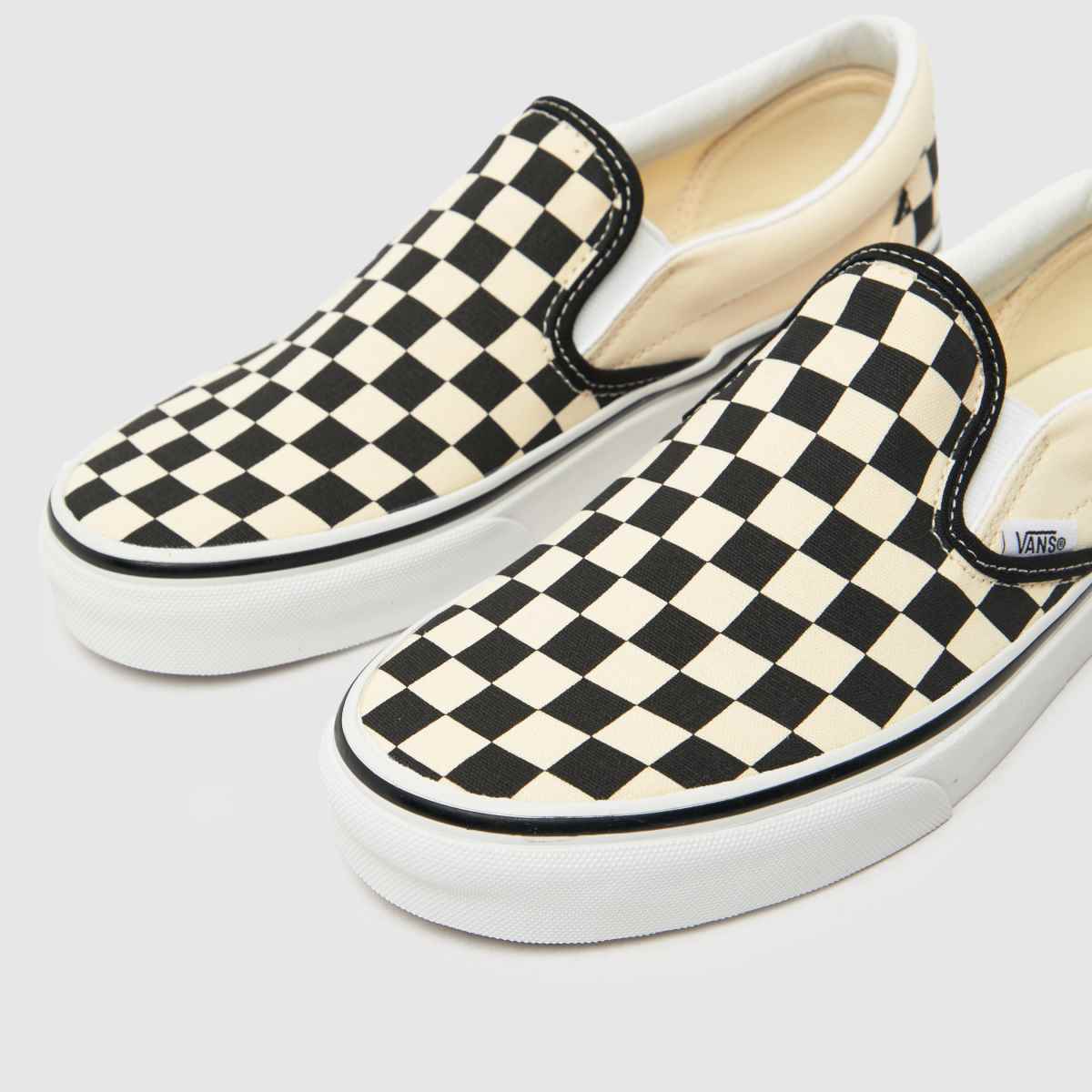 Vans – Schackrutiga klassiska slip-on-sneakers i svart och krämfärgat