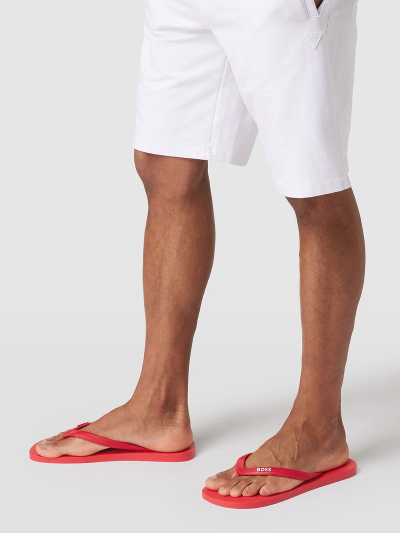 Zehentrenner mit Label-Schriftzug Modell 'Pacific' in hellrot