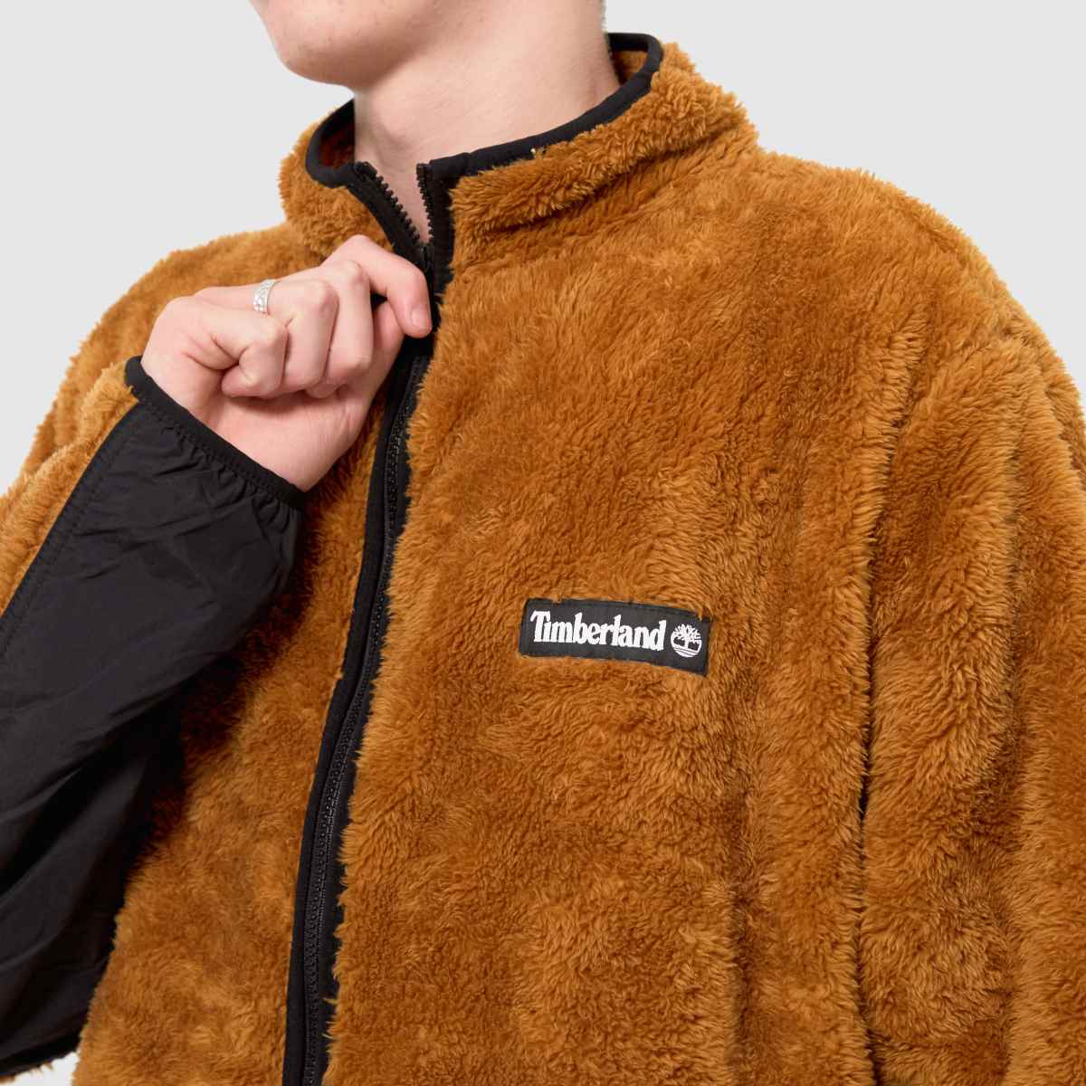 Timberland – Brun fleecejacka med hög lugg