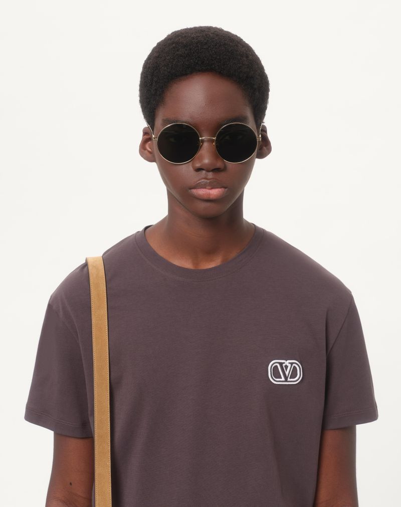 Camiseta de algodão com patch exclusivo Vlogo