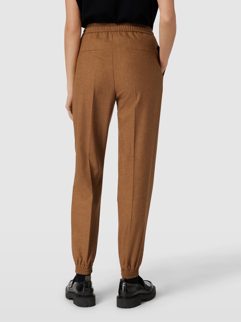 Hose mit seitlichen Eingrifftaschen Modell 'Talimala' in camel