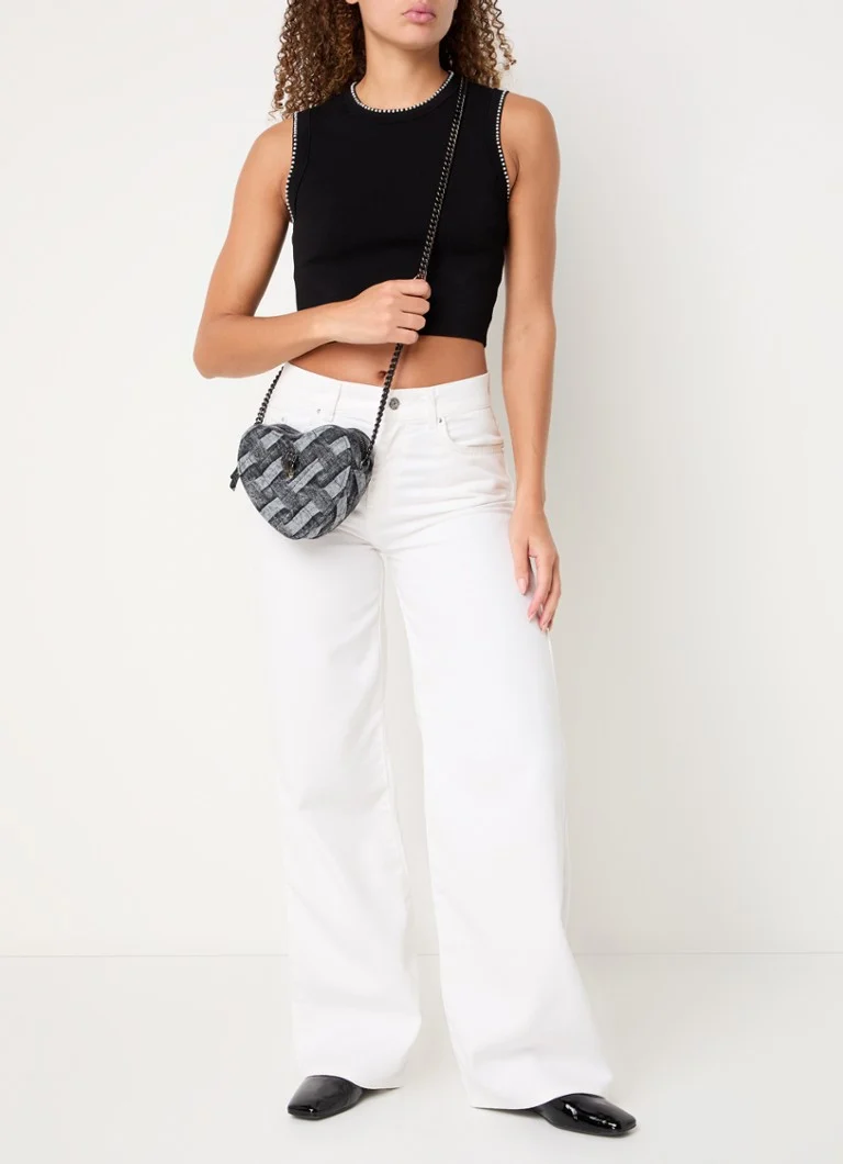 Borsa a tracolla Kurt Geiger a forma di cuore con motivo a quadri.