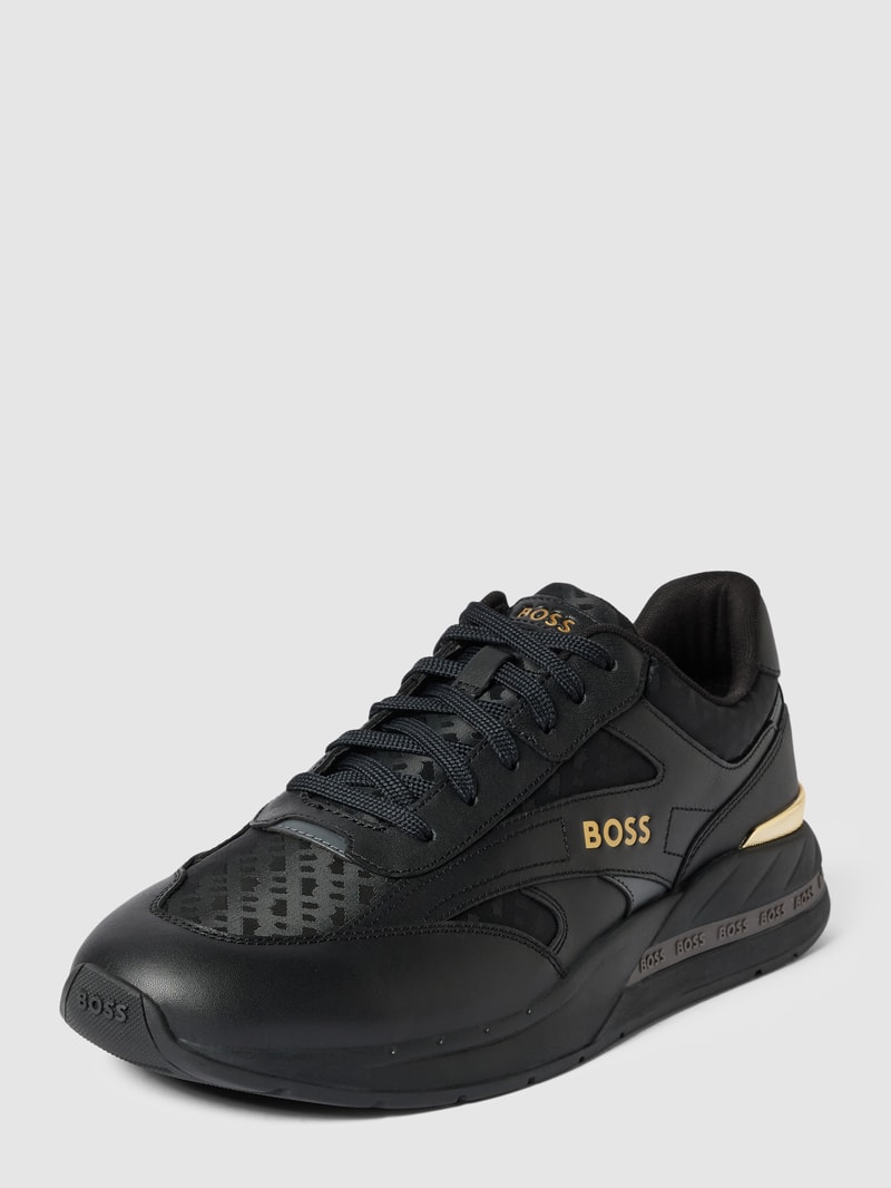 Sneaker aus Leder-Mix in schwarz