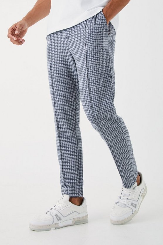 Schmale elastische Hose mit Hahnentritt-Print
