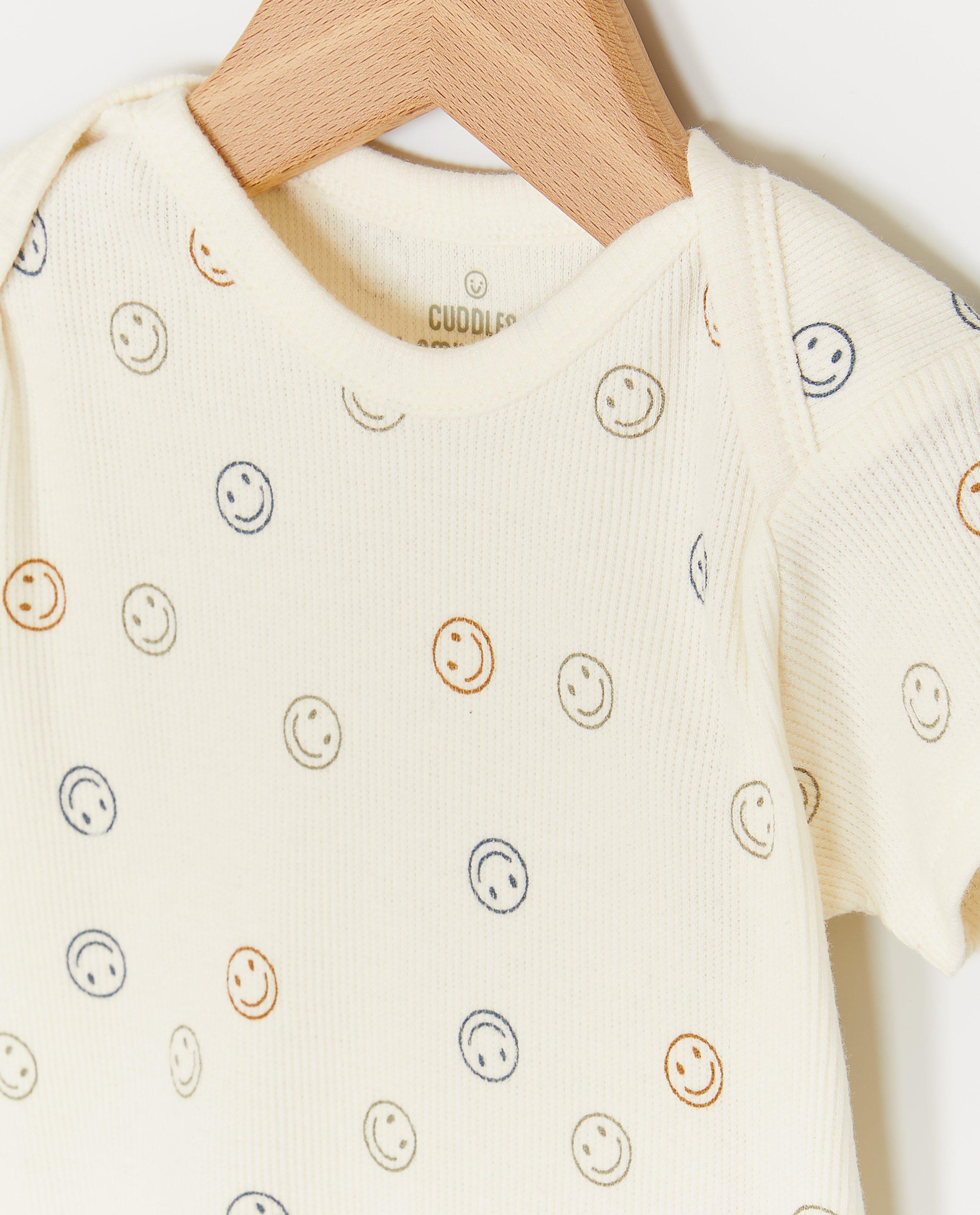 Cuddles and Smiles Romper med kuvertficka