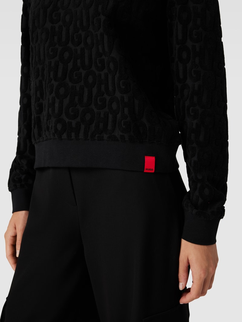 Hoodie mit Label-Strukturmuster Modell 'TERRY ME' in schwarz