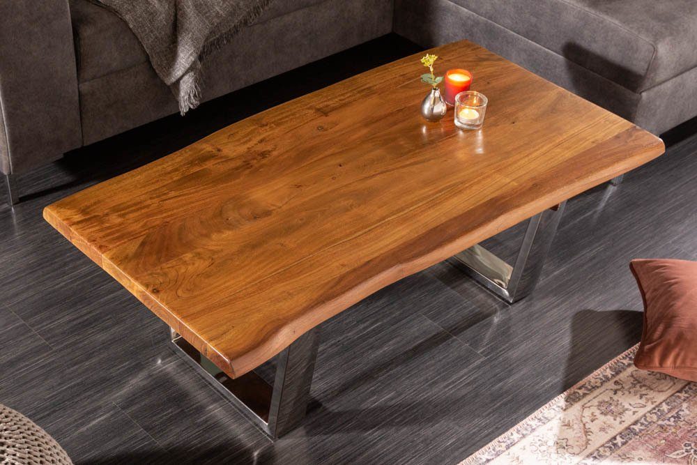 riess-ambiente Couchtisch MAMMUT 110cm honigfarben / silber (Einzelartikel, 1-St), Wohnzimmer · Massivholz · Baumkante · Edelstahl · Industrial