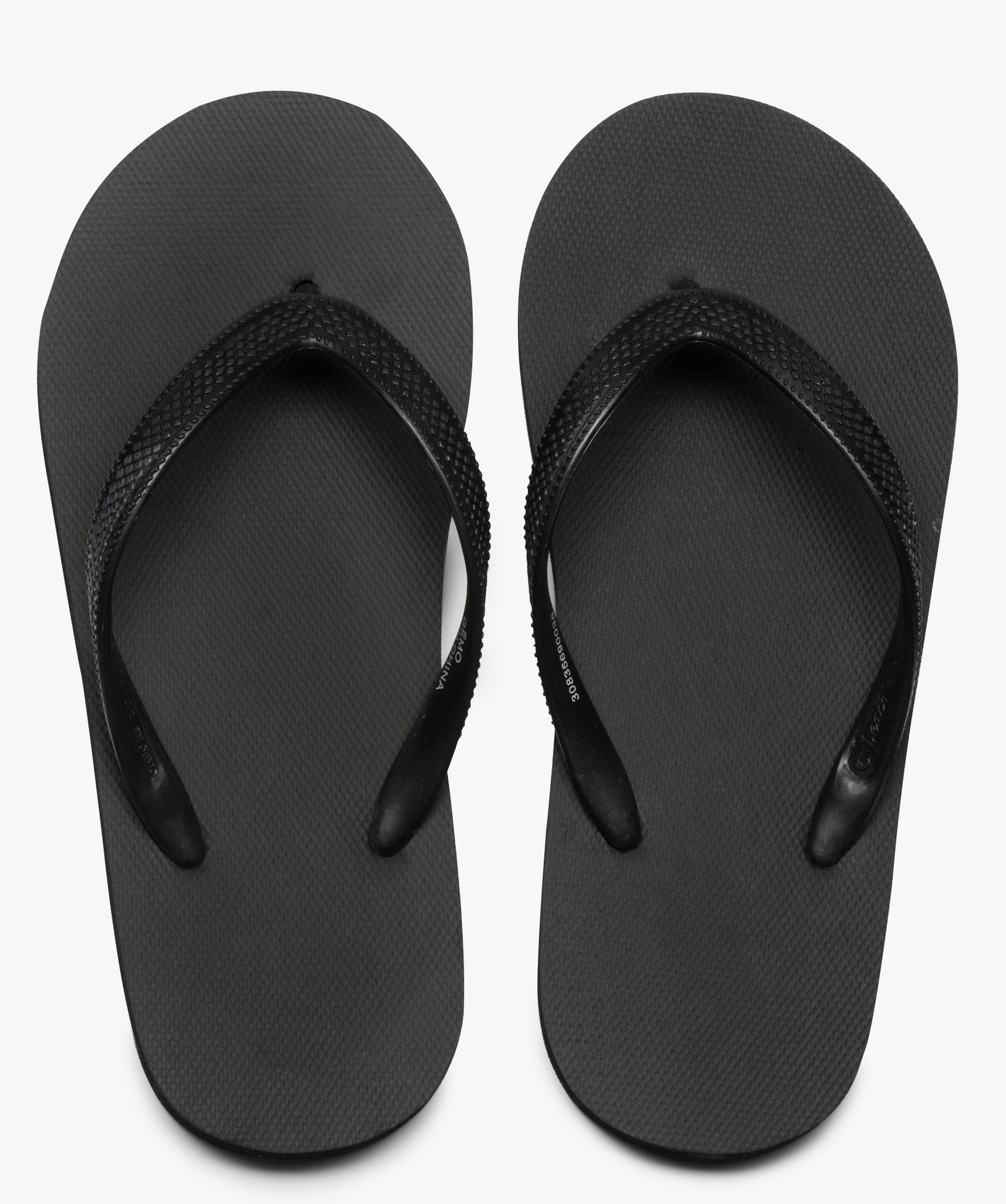 Tongs Garçon unies avec brides à reliefs noir | GEMO