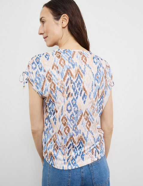 Gemustertes Kurzarmshirt mit Raffung