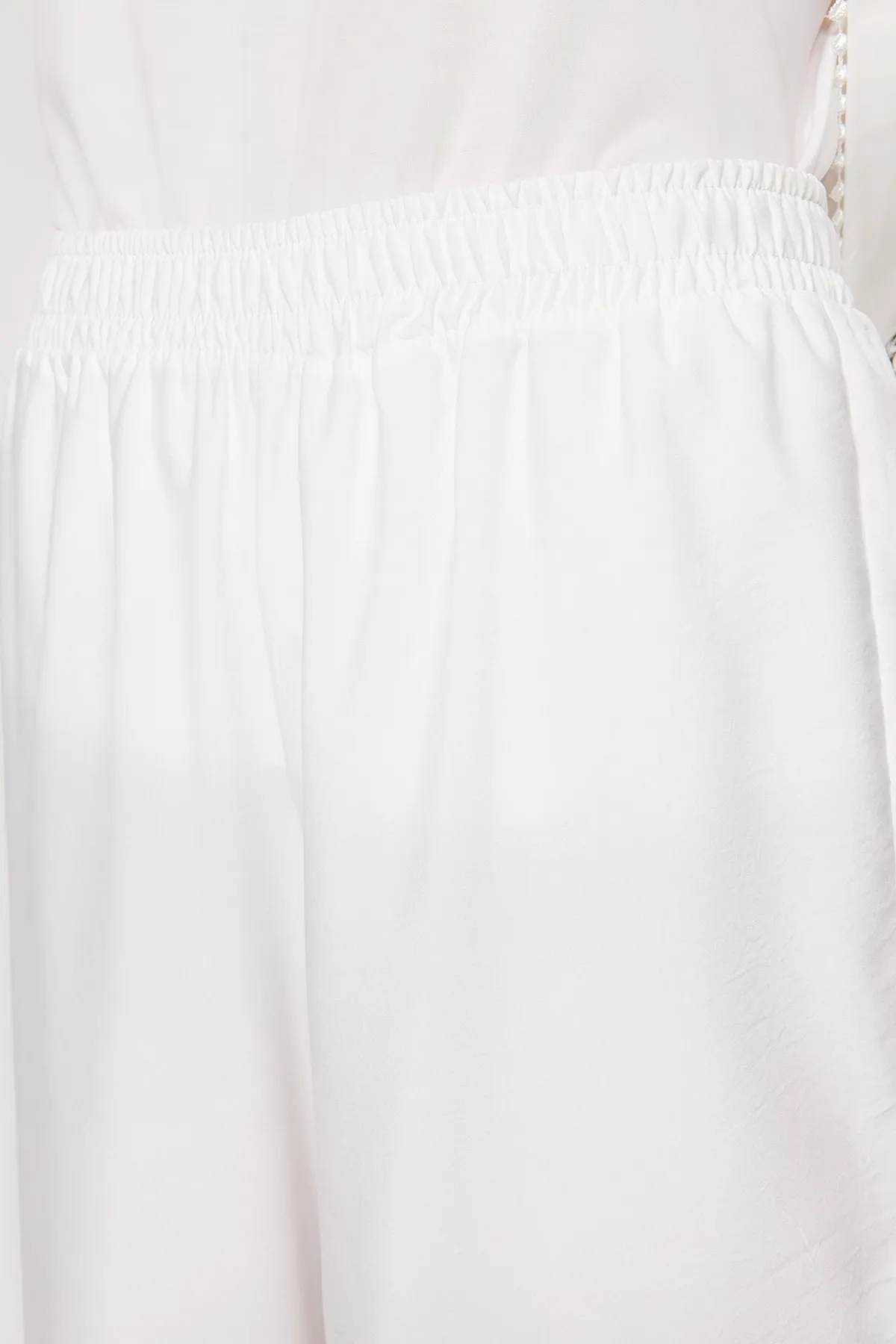 Trendyol Modest  Ecrufarbenes, gewebtes Tunika-Hosen-Set mit Gürtel und ethnischem Muster TCTSS23US00042