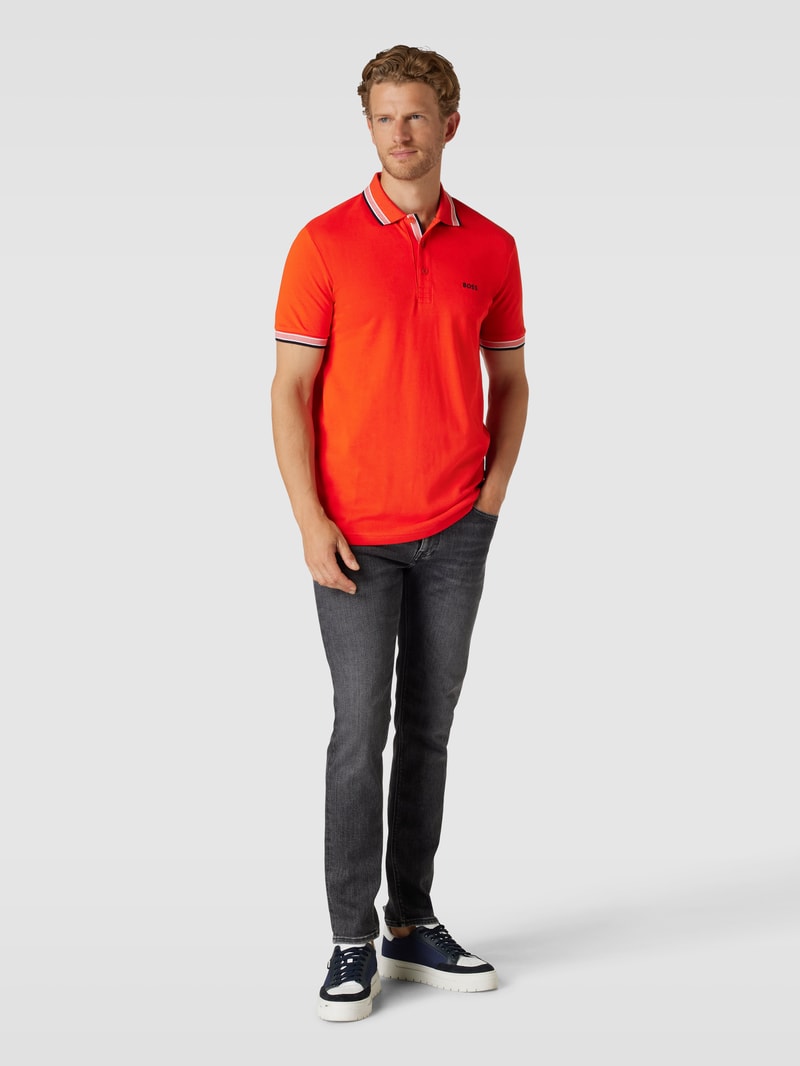 Poloshirt mit Label-Stitching Modell 'PADDY' in koralle