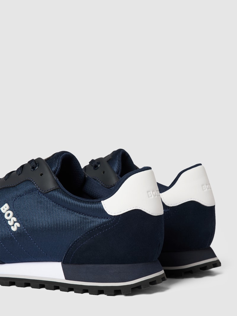 Sneaker mit Label-Applikation Modell 'PARKOUR' in marineblau