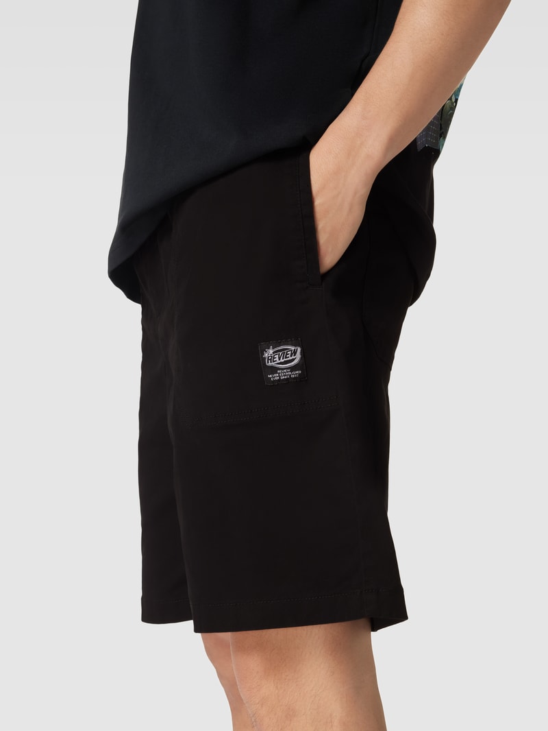 Bermudas mit Label-Patch in schwarz