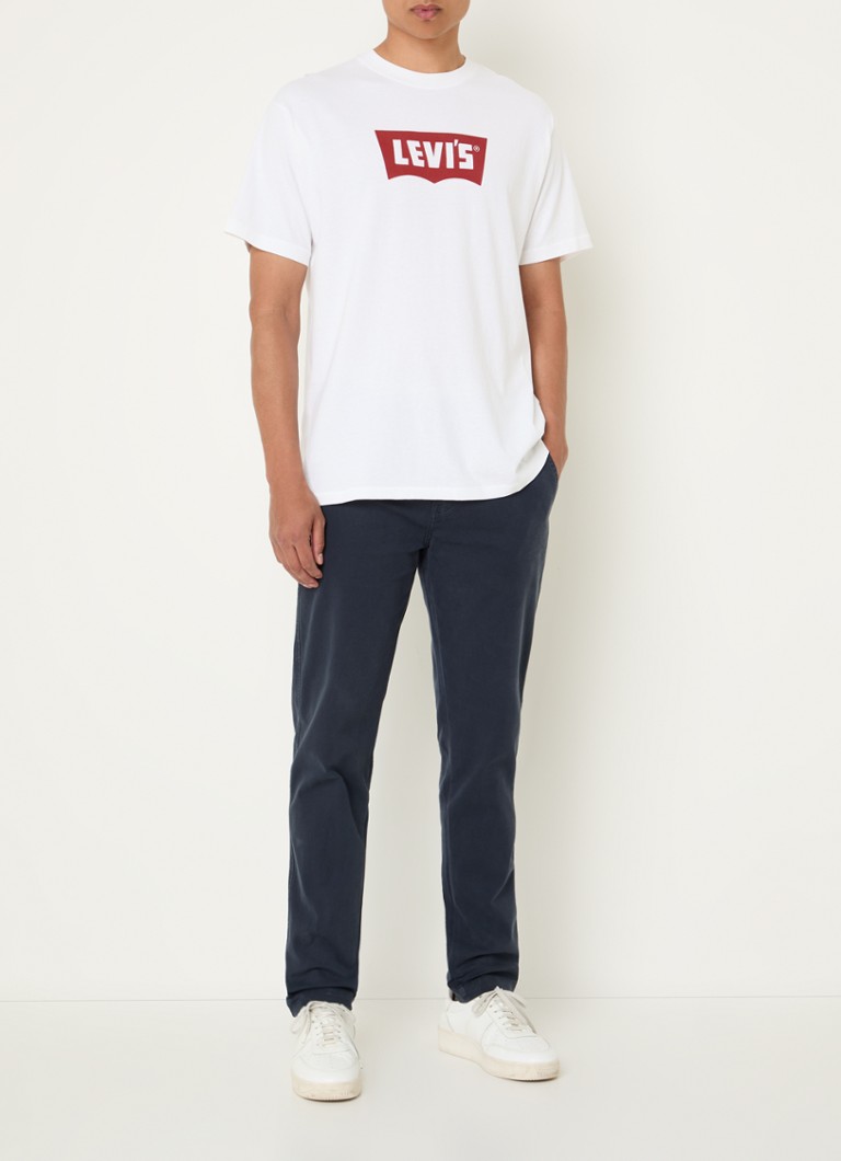 Pantaloni chino Levi's XX cu croială conică pe picioare și buzunare cusute.