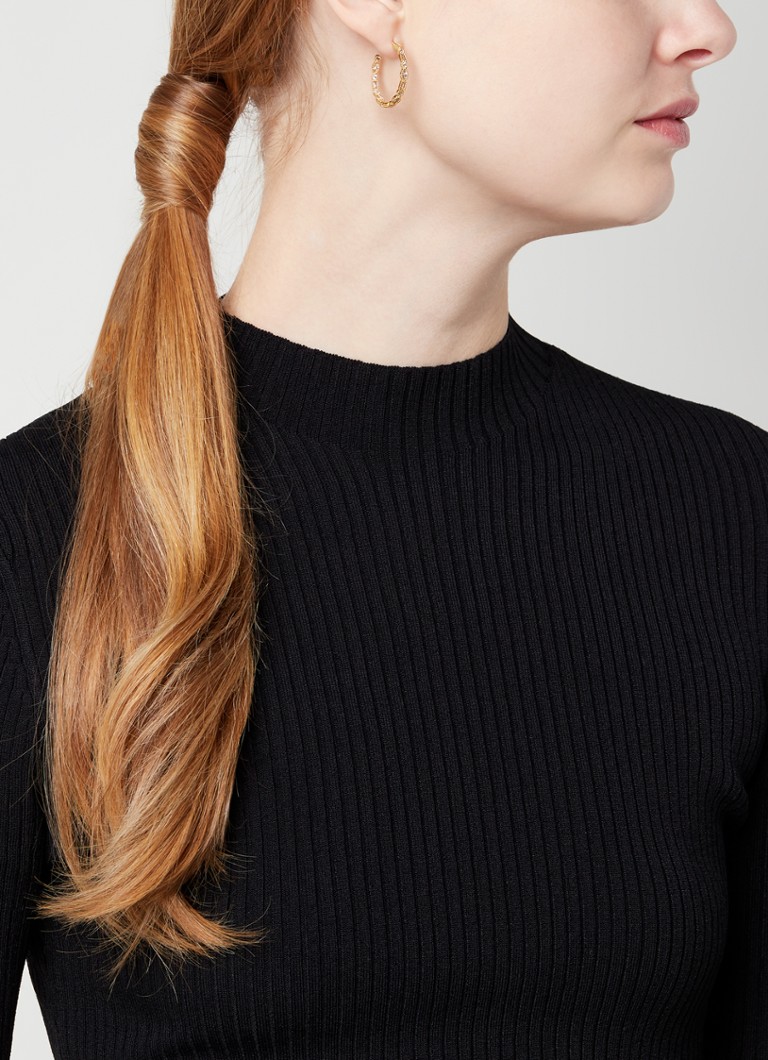Eleganti orecchini a cerchio Maje con pietre di zirconi.