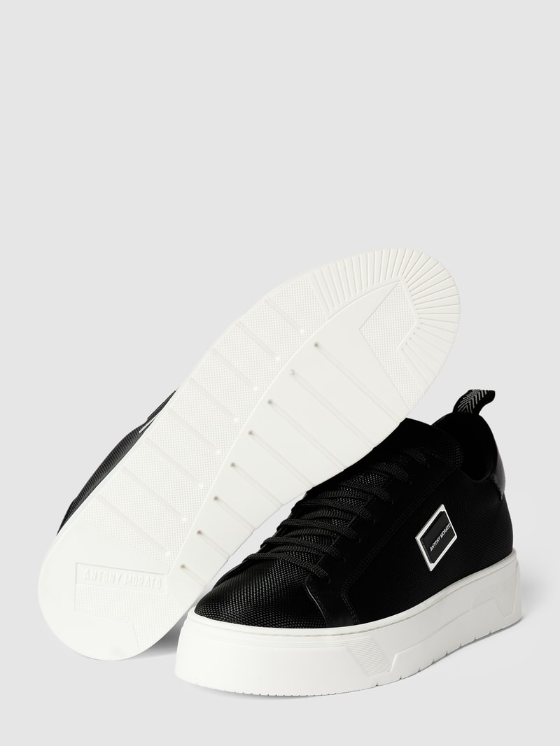 Sneaker mit Label-Details Modell 'PLAKETTE' in schwarz