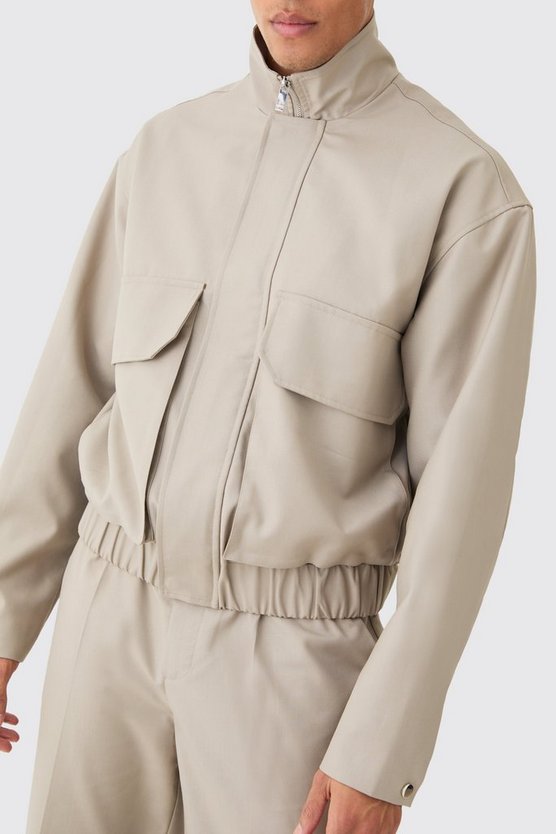 Smarte Jacke mit Cargo-Taschen und Trichterkragen