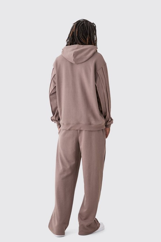 Oversize Hoodie mit rohem Saum und Man Signature Stickerei