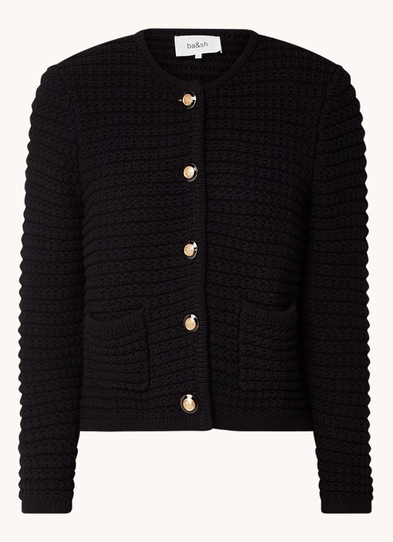 Cardigan Gaspard tricotat gros, croială scurtă și umeri cu burete, disponibil la ba&sh.
