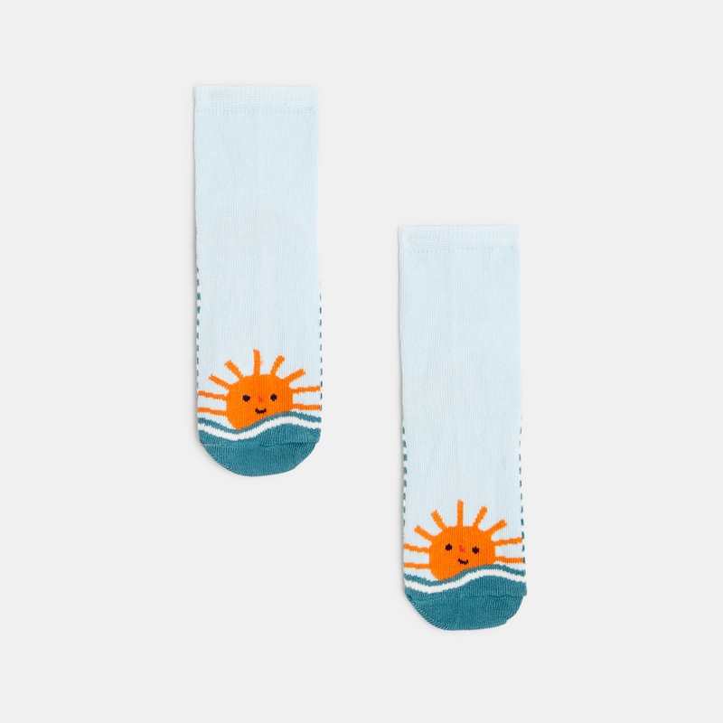 Chaussettes bébé garçon bleues à motifs soleil. Catimini