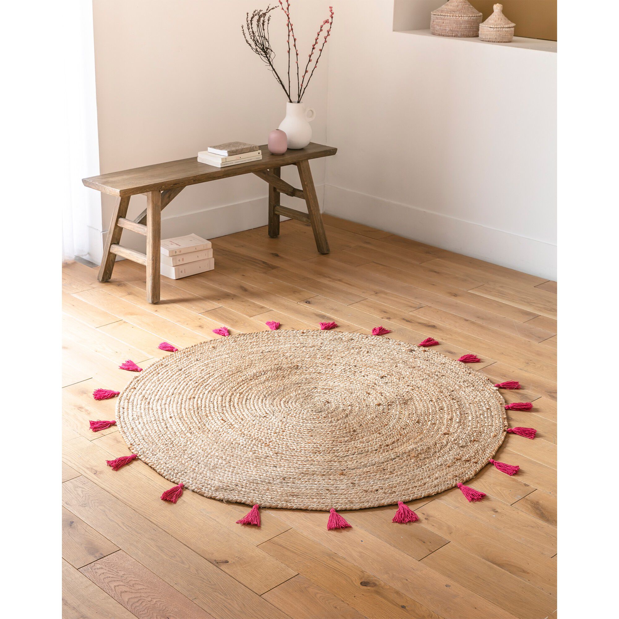 Tapis rond en jute avec pompons de couleur