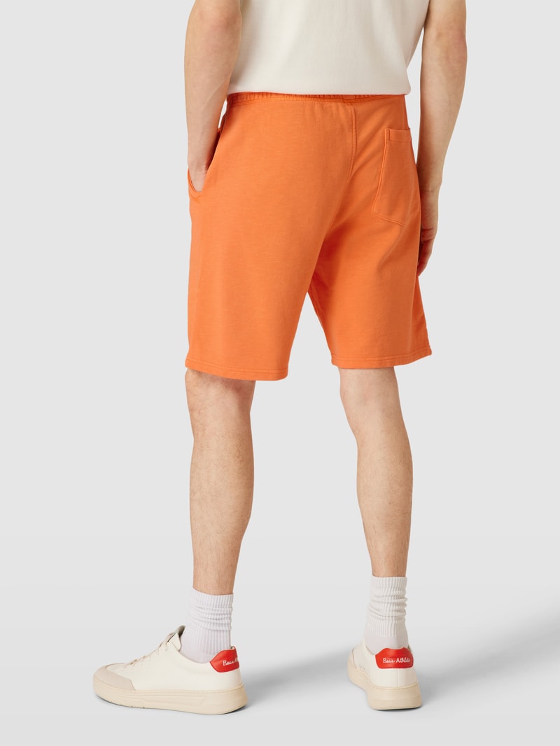Shorts mit seitlichen Eingrifftaschen in lachs