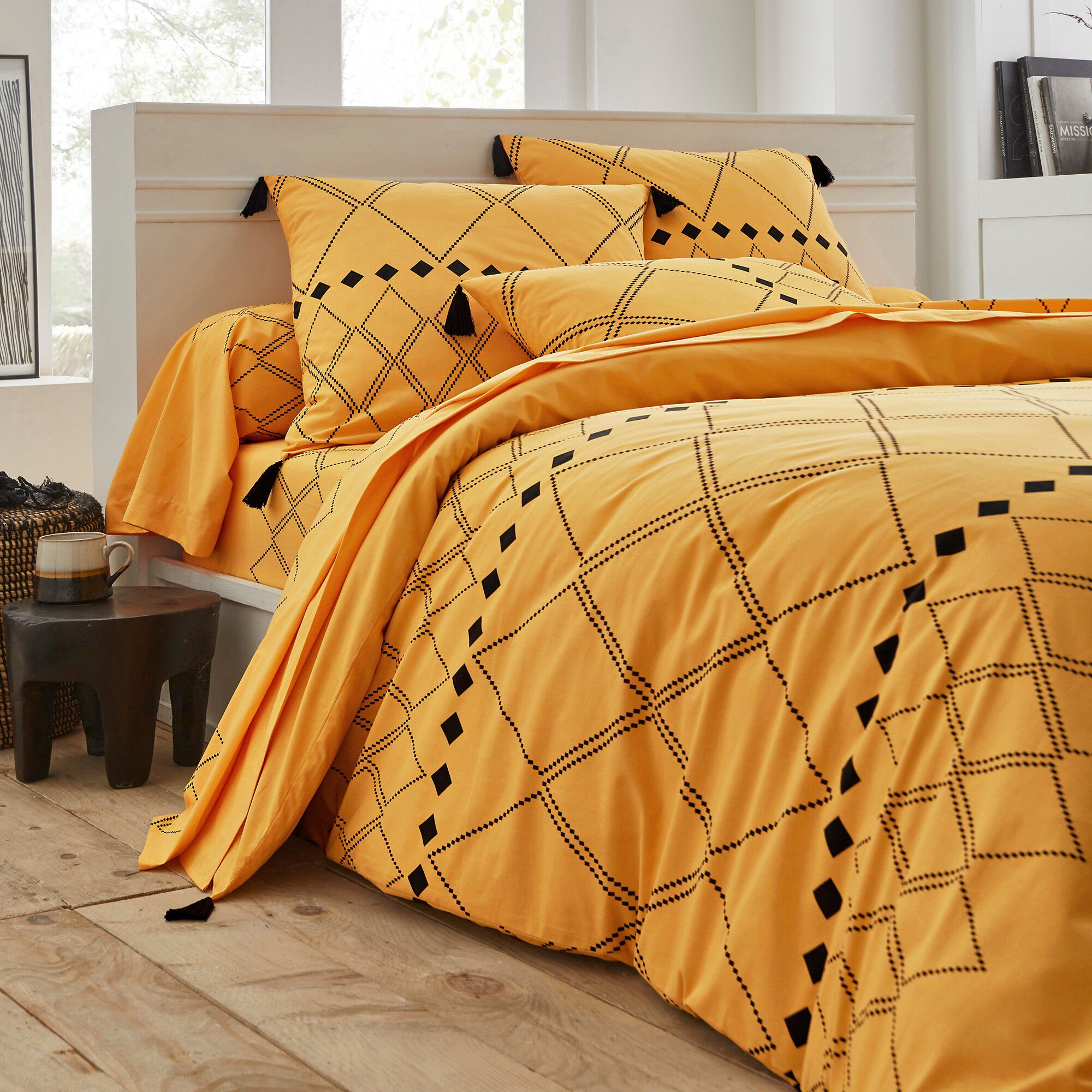 Linge de lit Massaï coton à motifs graphiques et finitions pompons