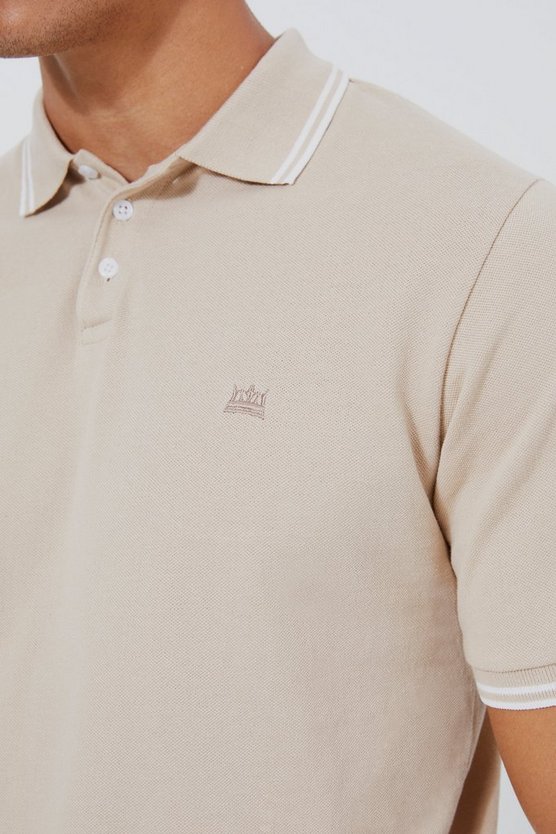 Pique Poloshirt mit Kronen-Stickerei