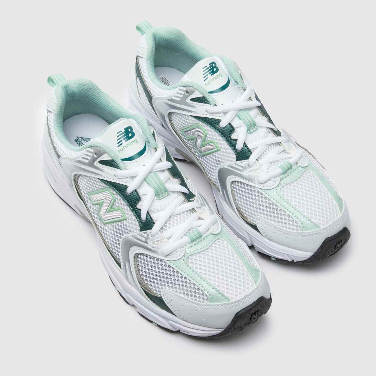 New Balance 530 träningsskor i vitt och grönt