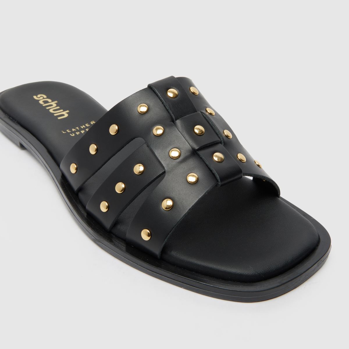 Schuh Tierney bőr szegecses öszvér szandál fekete színben