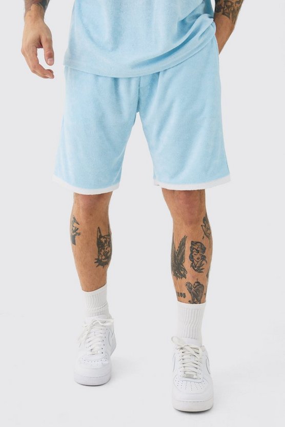 Lockere Frottee-Shorts mit Kontrast