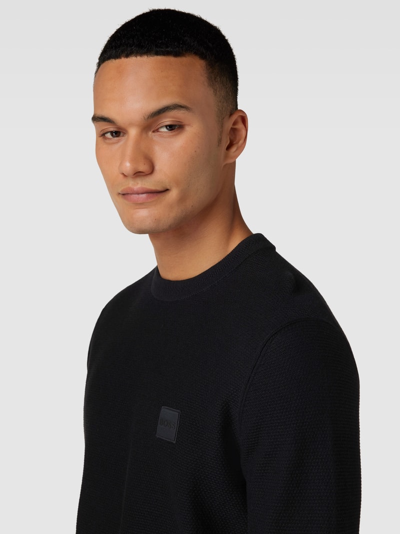 Strickpullover mit Label-Patch Modell 'Katoural' in schwarz