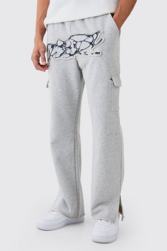 Gerade Jogginghose mit geteiltem Saum und zerrissener Applikation